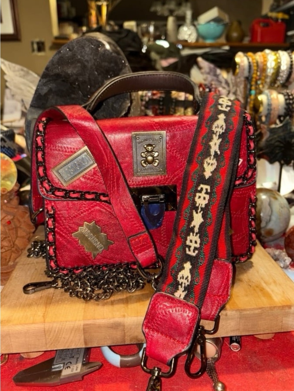 Red Leather Crossbody Bag with Decorative Strap